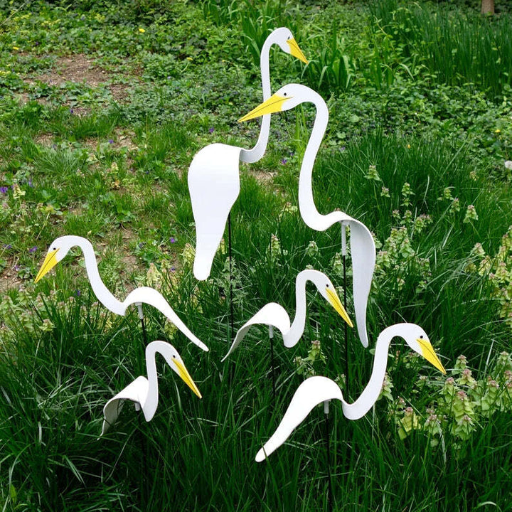 Whimsical flamingo wind spinner, handcrafted metal art, a delightful addition to any home garden