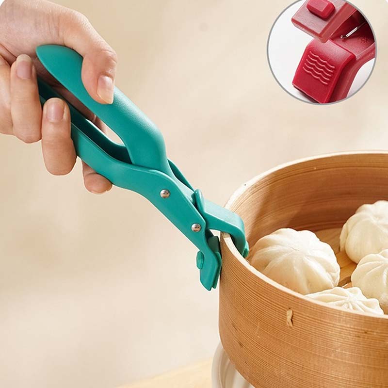 Ergonomic handle of an anti-scald bowl clip, providing a comfortable grip for kitchen safety.