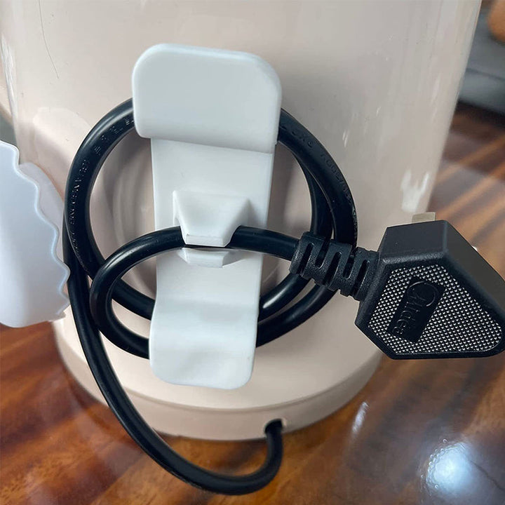 Flexible silicone cord organizer in white, perfect for kitchen appliance cable storage
