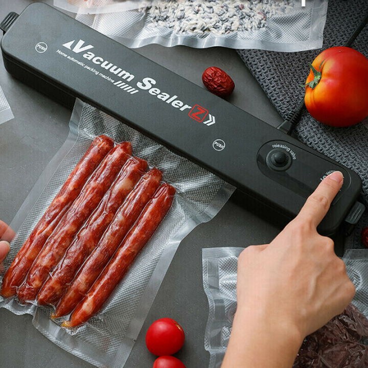 Electric food saver machine in a modern kitchen, perfect for meal prep & organization.