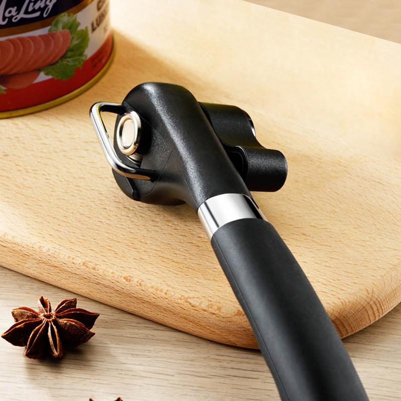 Kitchen Safe Edge Can Opener displayed with other kitchen tools, showcasing its essential role in food prep.