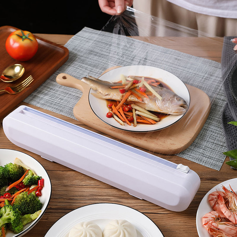 Multi-roll wrap dispenser for kitchen organization, neatly storing and cutting food wrap, foil, and parchment.