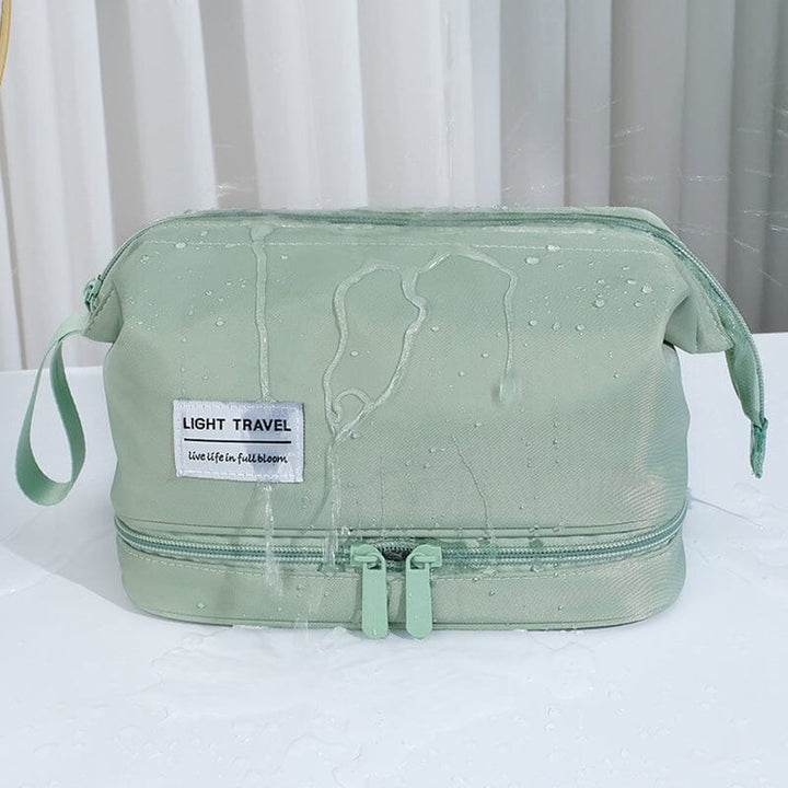 Waterproof cosmetic bag, front view with a subtle logo, emphasizing its unisex and portable design for travel.