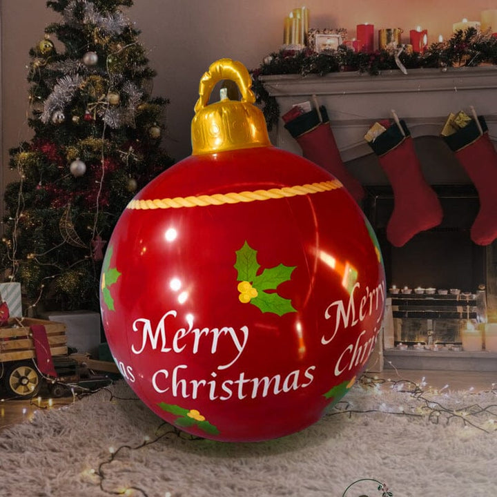 Large red inflatable Christmas ball with 'Merry Christmas' text for outdoor holiday decor