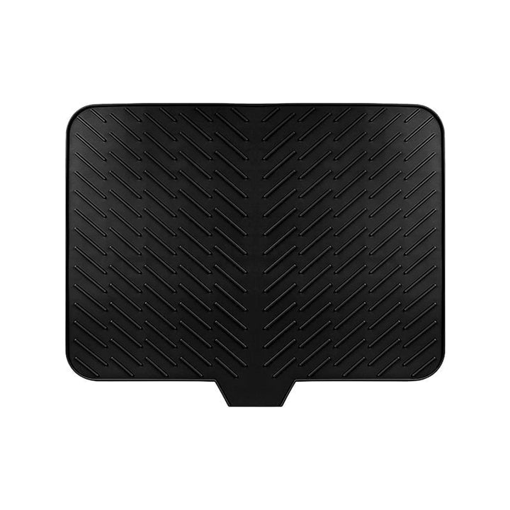 Large blue silicone drying mat integrated into a modern kitchen design, blending aesthetics with functionality