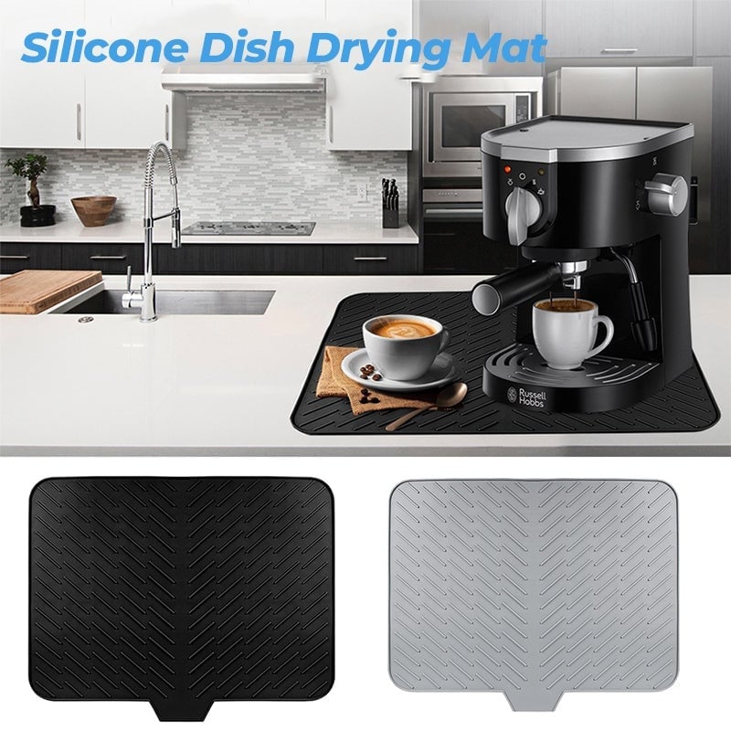 Foldable silicone dish mat, white, showcasing its flexibility on a kitchen counter, compact storage, tidy kitchen