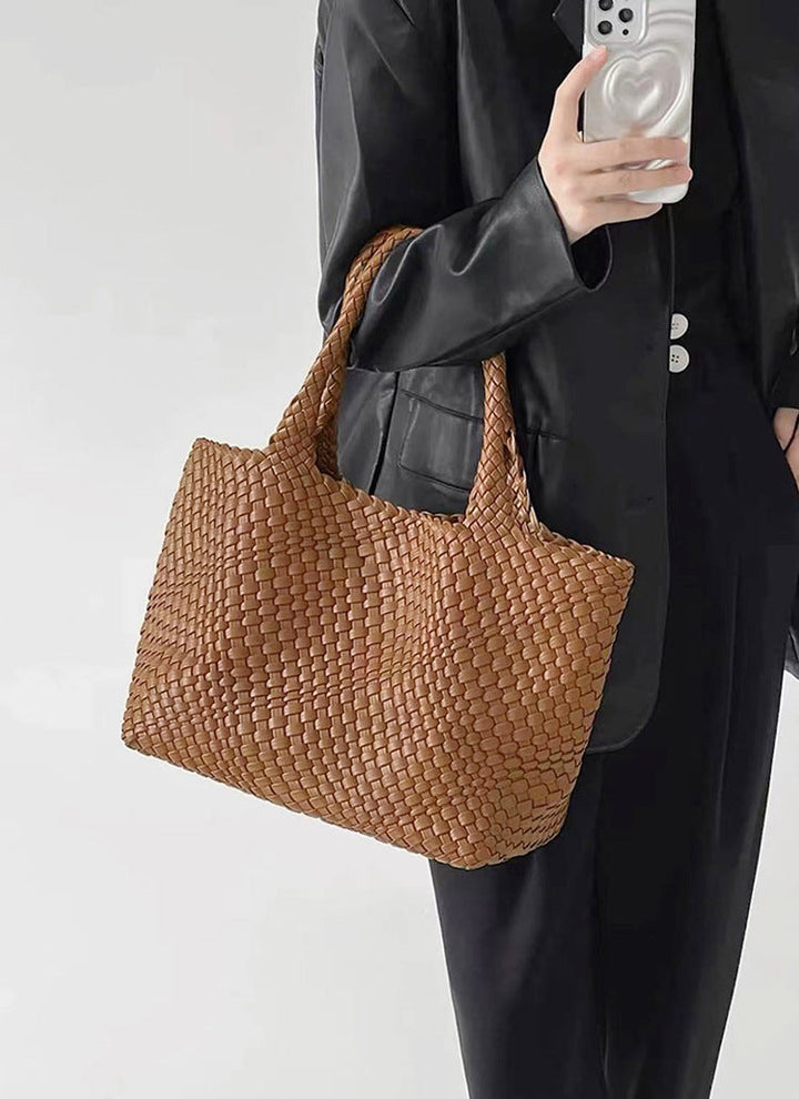 Women's large woven shoulder bag, a fashionable everyday carry tote accessory.