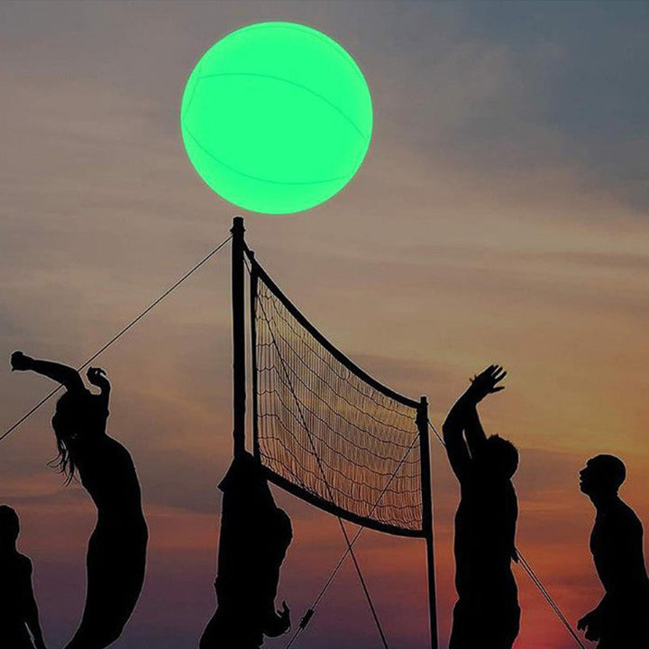 Water activities with a bright LED inflatable beach ball, fun for all ages