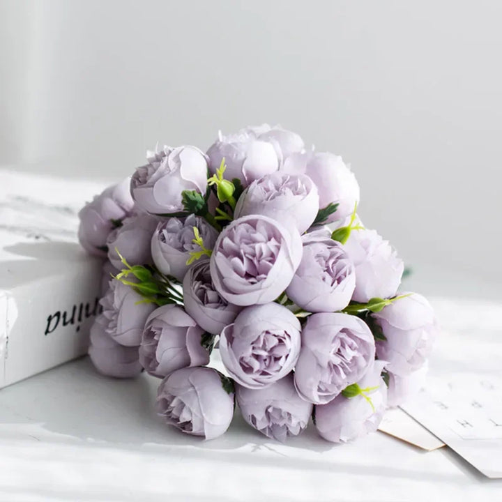 Lifelike silk peony flower bouquet for elegant home decor, featuring realistic faux blooms and lush greenery.