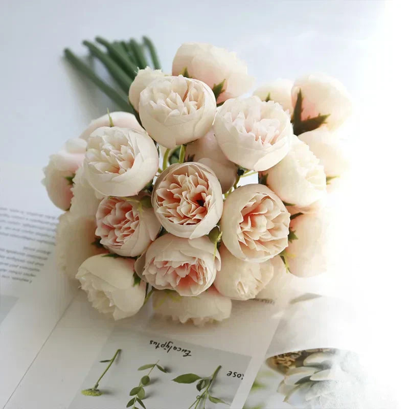 Close-up of soft silk peony petals, showcasing the realistic texture of this artificial floral bouquet.