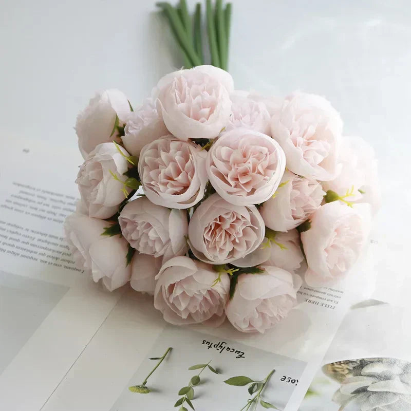 Beautiful pink and white silk peonies arranged in a classic style, perfect for timeless floral decor.