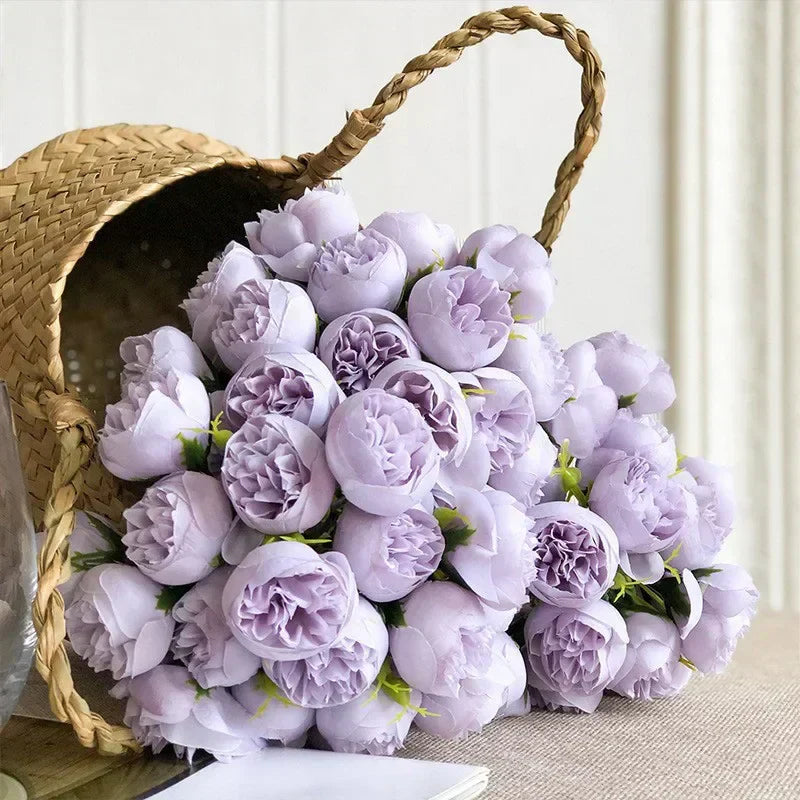 Romantic silk peony arrangement enhancing a bedroom or living space with its elegant and lifelike charm.