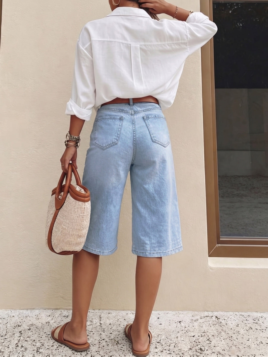 Stylish light blue high waist culotte shorts for women, featuring a relaxed wide leg cropped fit.