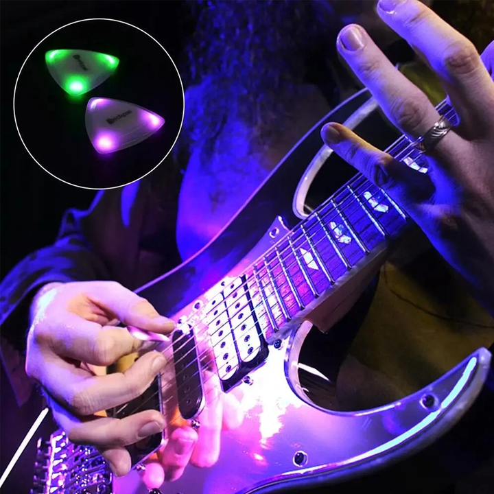 Light Up Guitar Pick glowing green, showcasing its LED feature for musicians and performances.