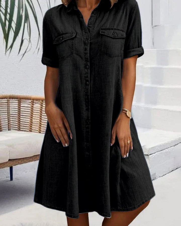 Light blue women's denim-look shirt dress, versatile & lightweight for spring and summer fashion.