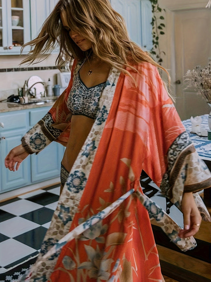 Flowy women's floral kimono, lightweight & comfy. Elegant beach cover-up, adds boho chic to vacation style.