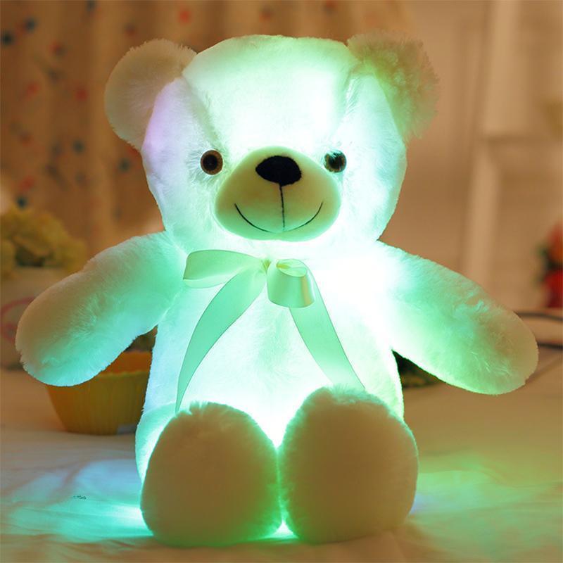 Collection of LED plush teddy bears in different sizes, creating a magical decorative light display