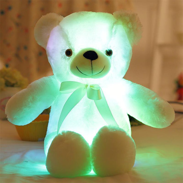 Collection of LED plush teddy bears in different sizes, creating a magical decorative light display