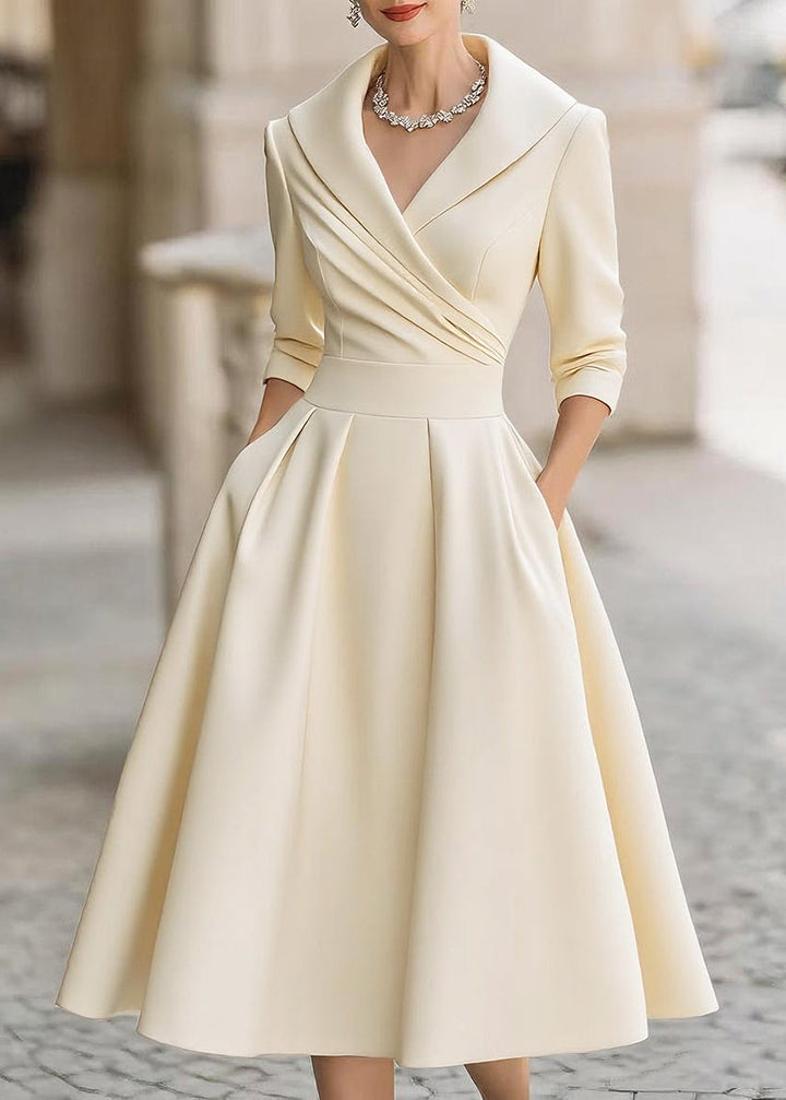 Women's formal A-line midi dress with a luxurious sheen, flattering draped collar, and pockets.