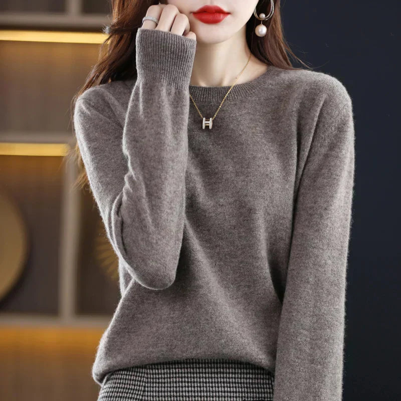 Warm & soft women's long-sleeve crewneck pullover sweater. Perfect for versatile, comfortable wear.