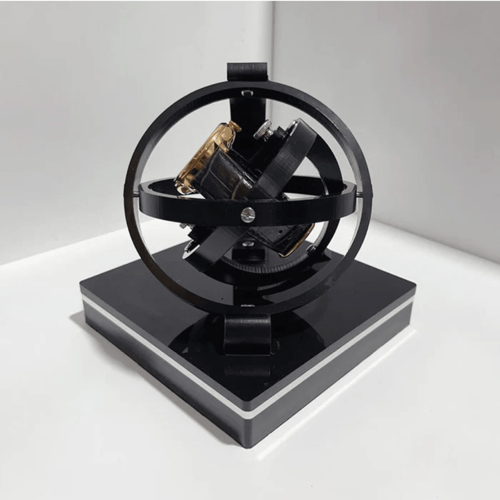 Sleek automatic watch winder with silent motor and luxury display case, essential watch accessory.