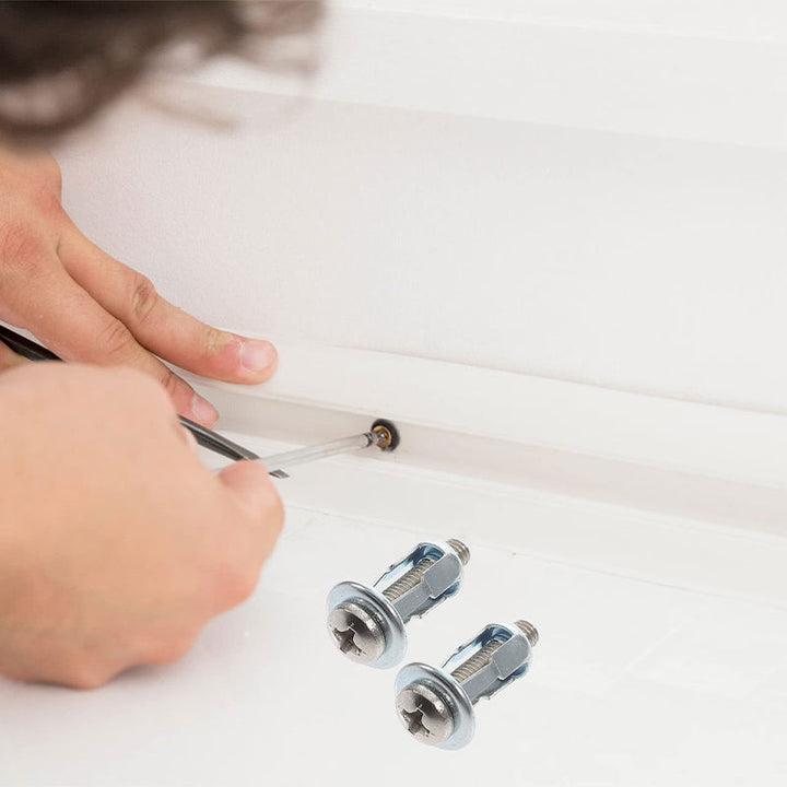 Hand holding an expansion screw petal nut, demonstrating its size and ready for installation.