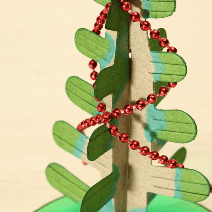 Children excitedly watching their Magic Growing Crystal Tree develop, educational science kit