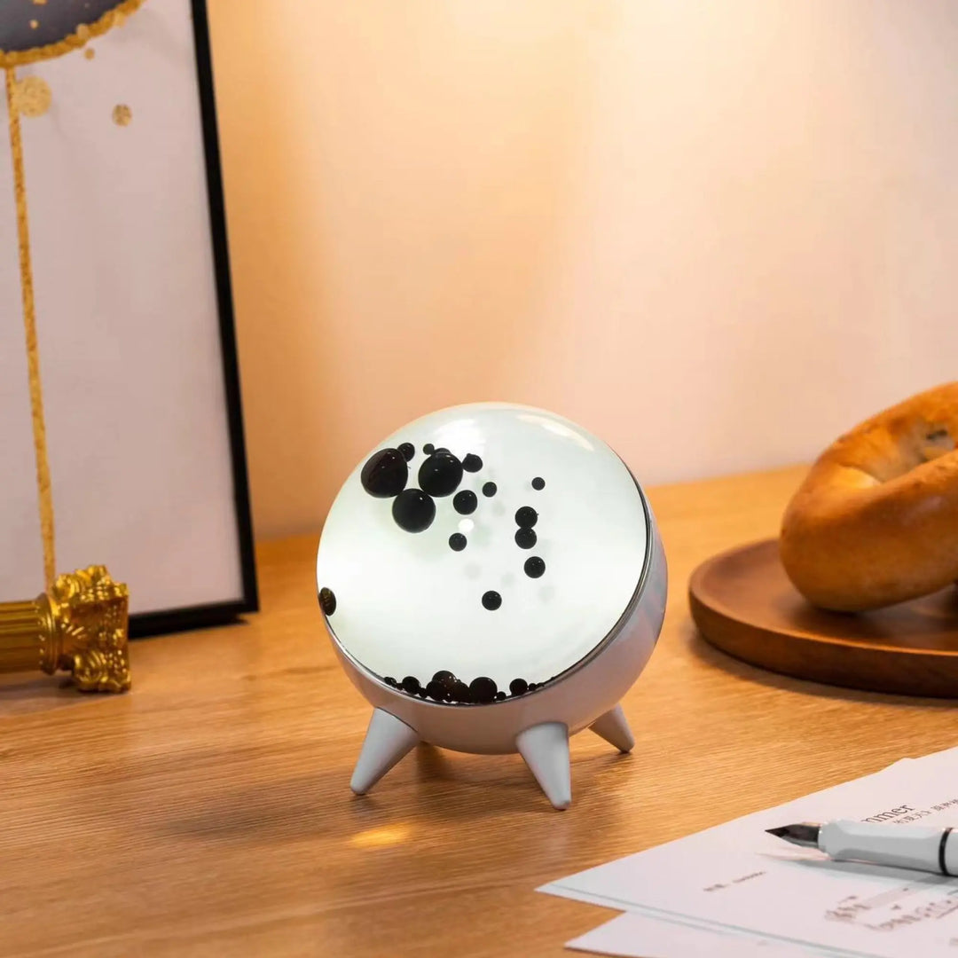 Decorative MagnePulse music-reactive ferrofluid display, a captivating tech gadget for ambient lighting.