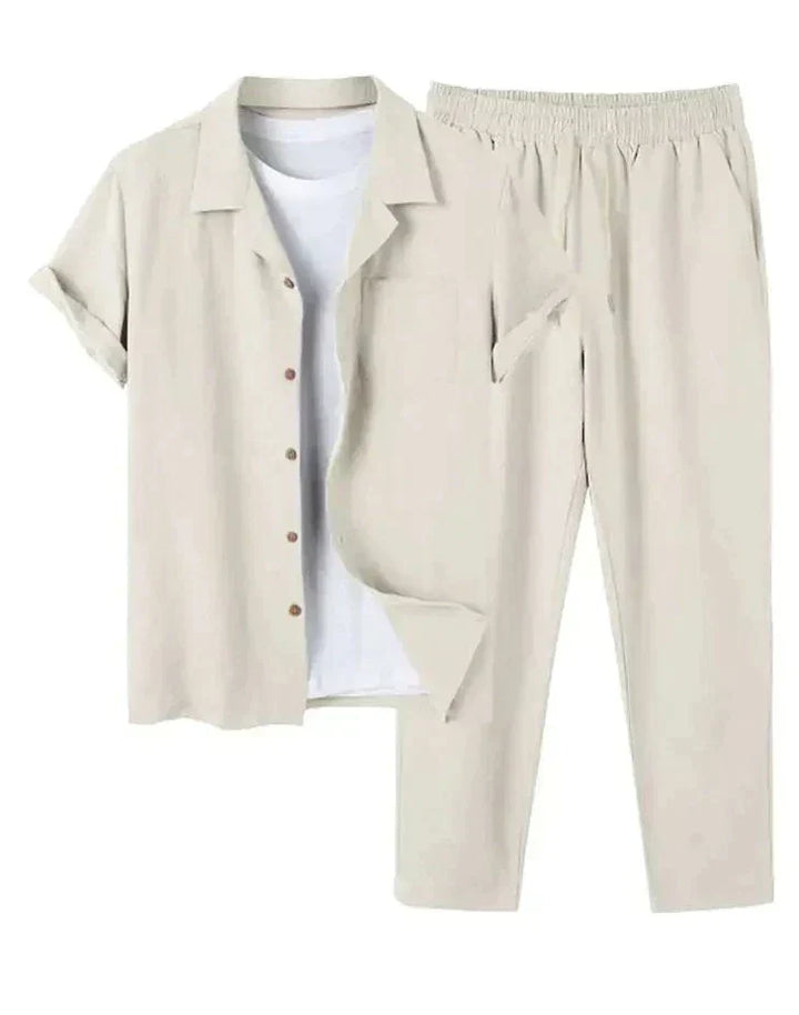 Men's casual summer short sleeve shirt and shorts set styled for a relaxed beach day or vacation outfit.