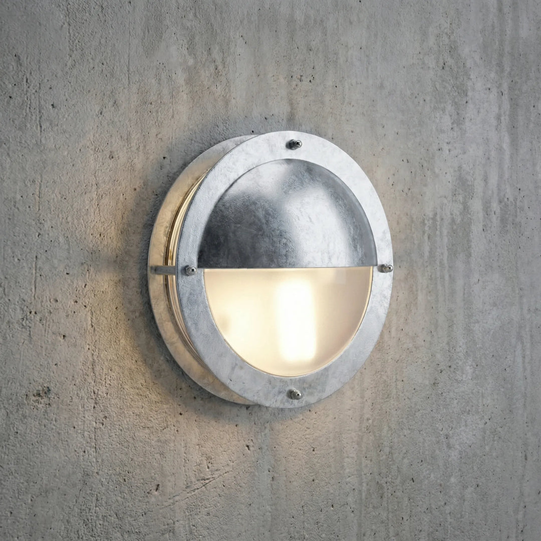 Stylish Marinova round dimmable LED outdoor wall light for modern home exterior, porch & entryway illumination.