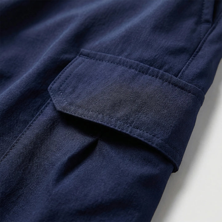Men's quick-dry activewear cargo shorts with ample storage, perfect for hiking, travel & casual use.