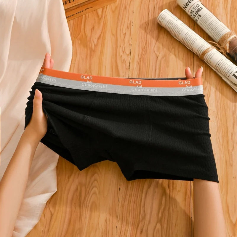 Men's antibacterial boxer briefs with moisture-wicking properties, flat lay