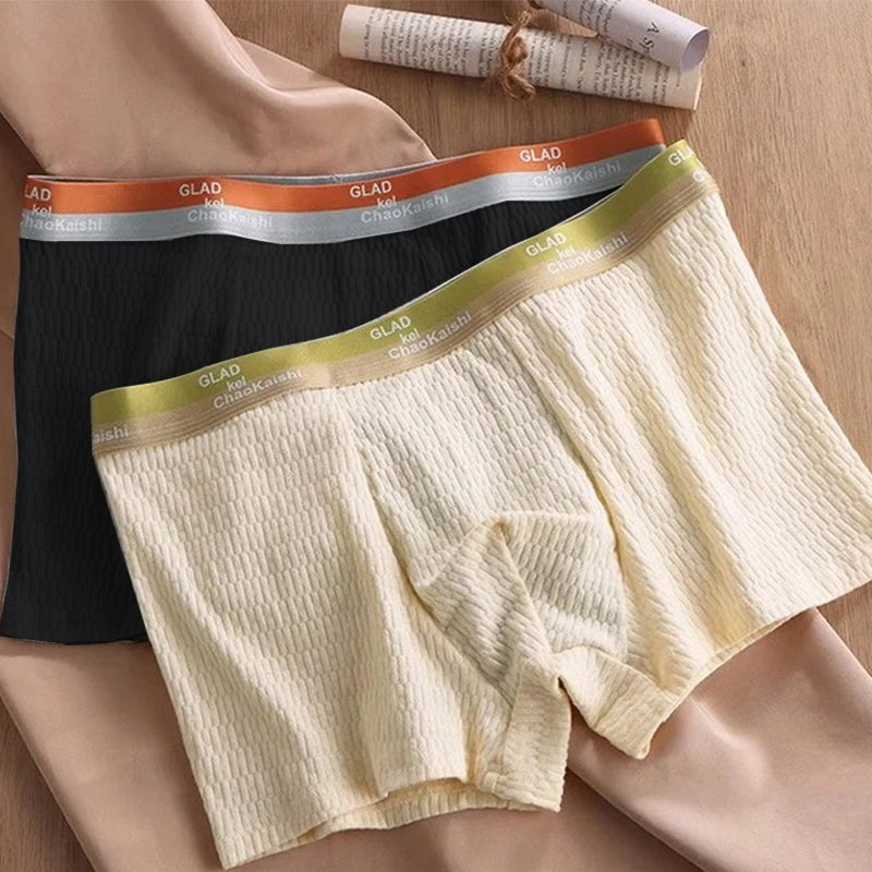 Model wearing grey men's antibacterial breathable boxer briefs, front view