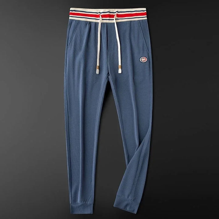 Versatile men's joggers, great for sports or casual outings. Easy care athletic pants with comfort.