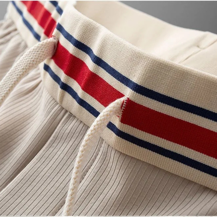 Modern men's athleisure pants, combining comfort, style, & a tailored fit for any activity.