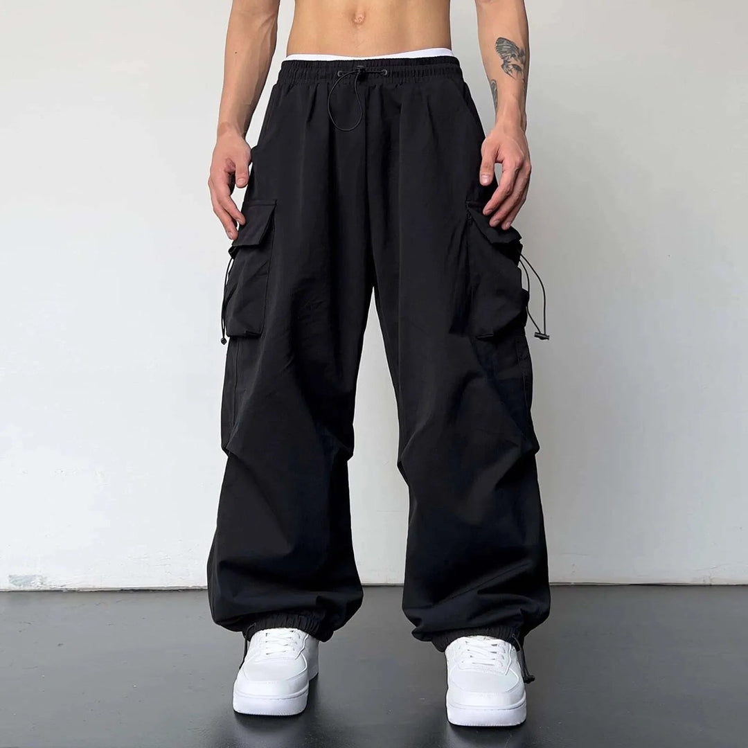 Comfortable men's loose fit utility cargo pants, perfect for streetwear and casual wear with multiple pockets.