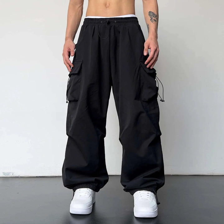 Comfortable men's loose fit utility cargo pants, perfect for streetwear and casual wear with multiple pockets.