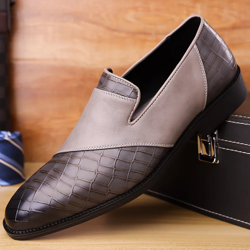 Comfortable men's slip-on loafers with a distinctive croc-embossed texture, ideal for dress or casual.