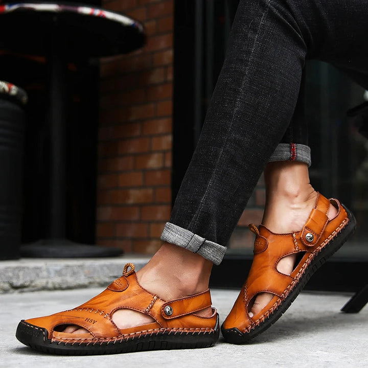 Men's closed-toe slip-on sandals featuring cushioning and arch support for comfortable daily wear.