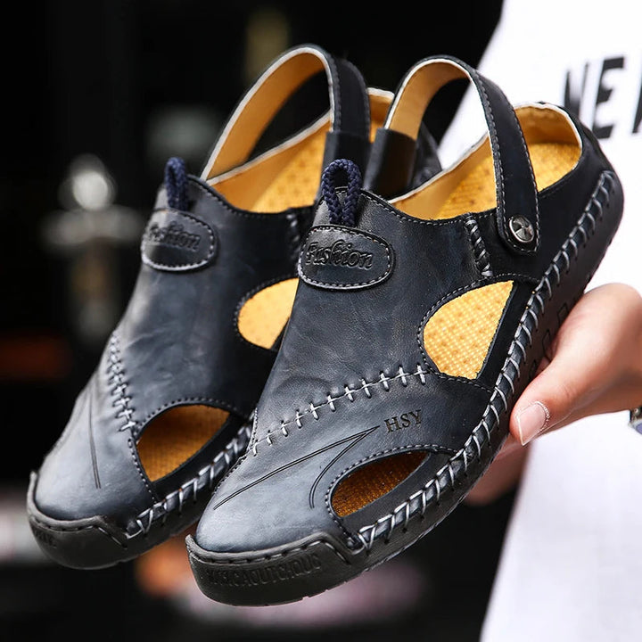 Stylish men's closed-toe slip-on sandals, cushioned for maximum comfort during summer activities.