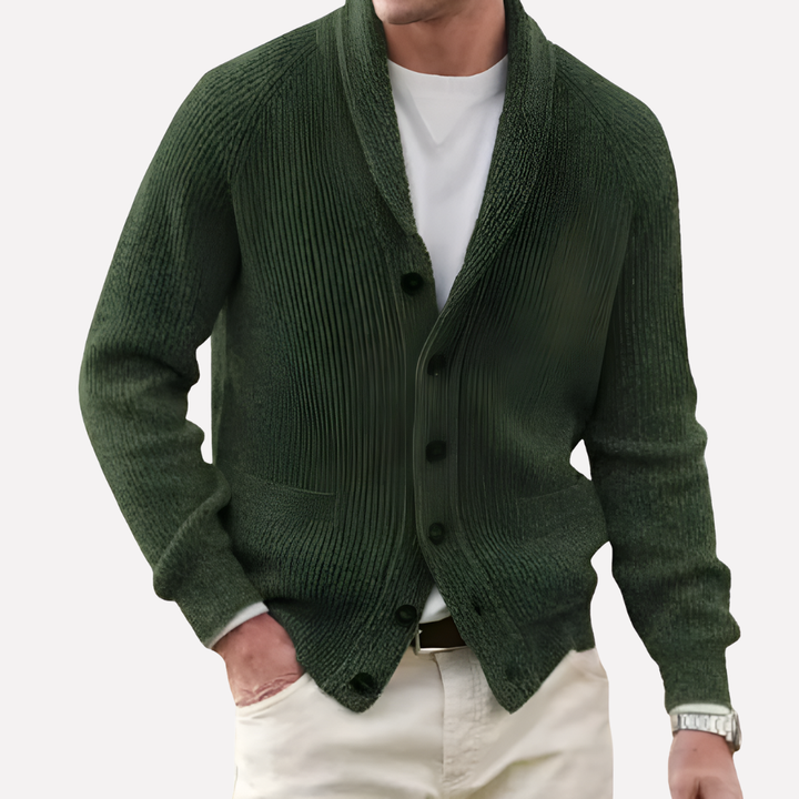 Stylish men's timeless shawl collar button-front cardigan. Black knitwear with practical patch pockets for layering.