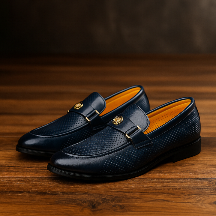 Perforated brown slip-on loafers for men, offering a stylish and breathable option for casual wear.