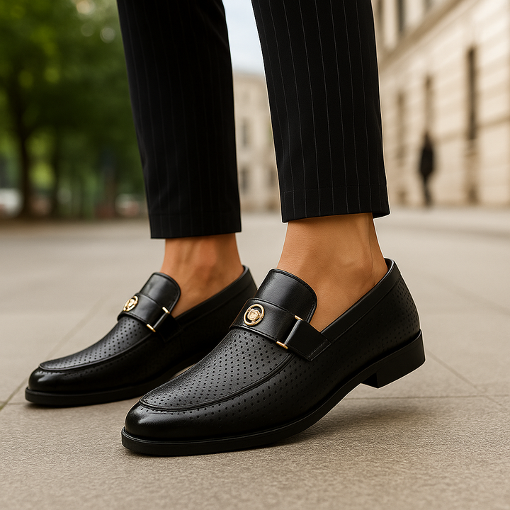 Detailed view of the sole and perforated upper of men's slip-on dress shoes, emphasizing comfort features.