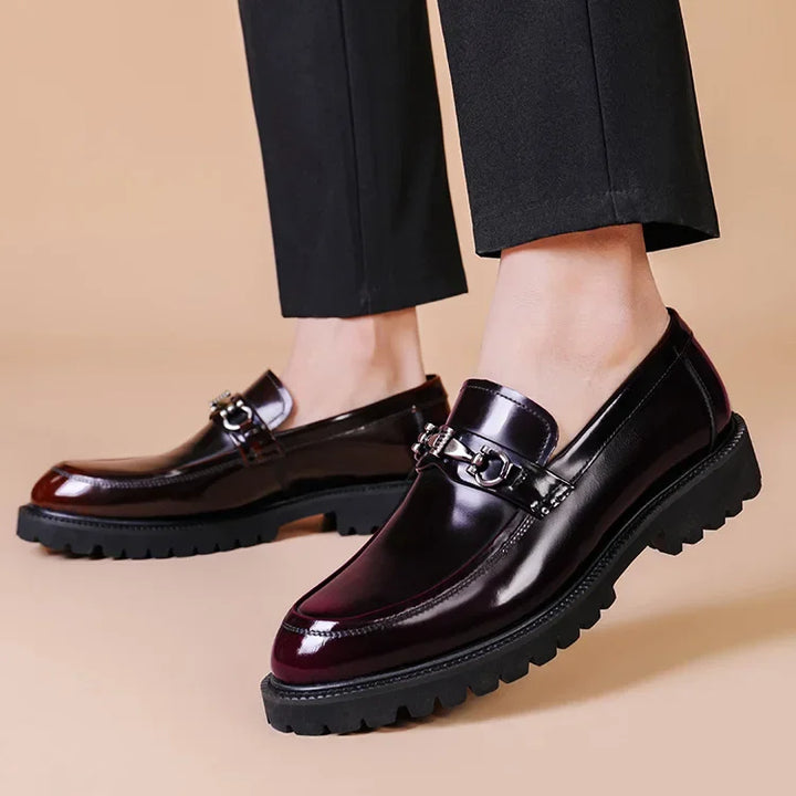 Front view of men's comfortable dress loafers with a sleek, polished finish.