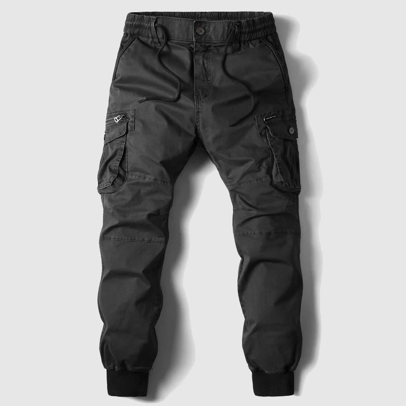 Active men's khaki cargo joggers, offering a comfortable fit with tactical pockets for utility & everyday wear.