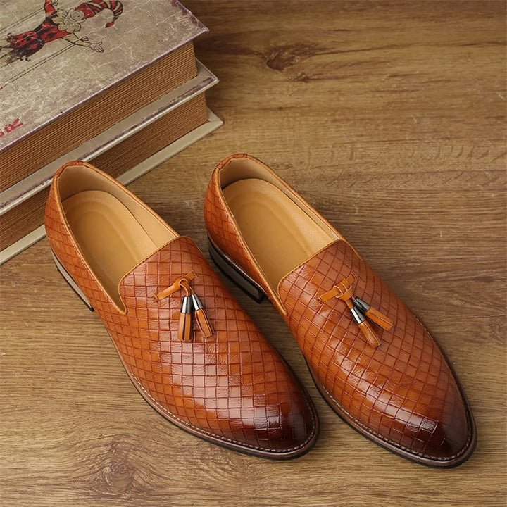 Men's dress shoes, textured brown tassel loafers from above, showing comfortable opening