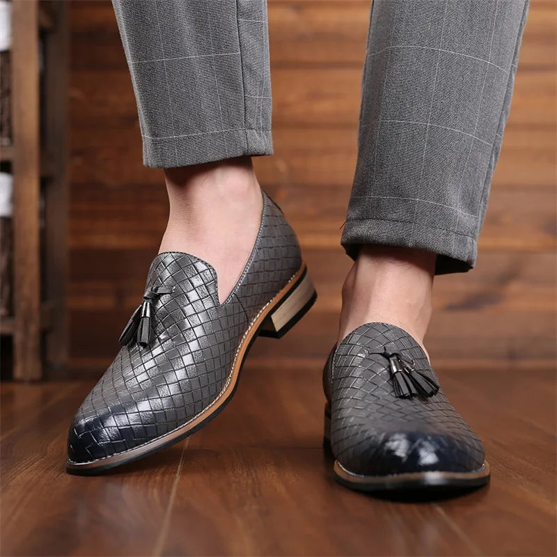 Men's versatile dress shoes: brown textured tassel loafers on a clean surface, ready for wear
