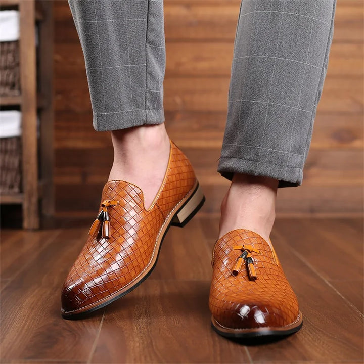 Modern men's fashion: detailed texture on classic tassel loafers, combining comfort and style