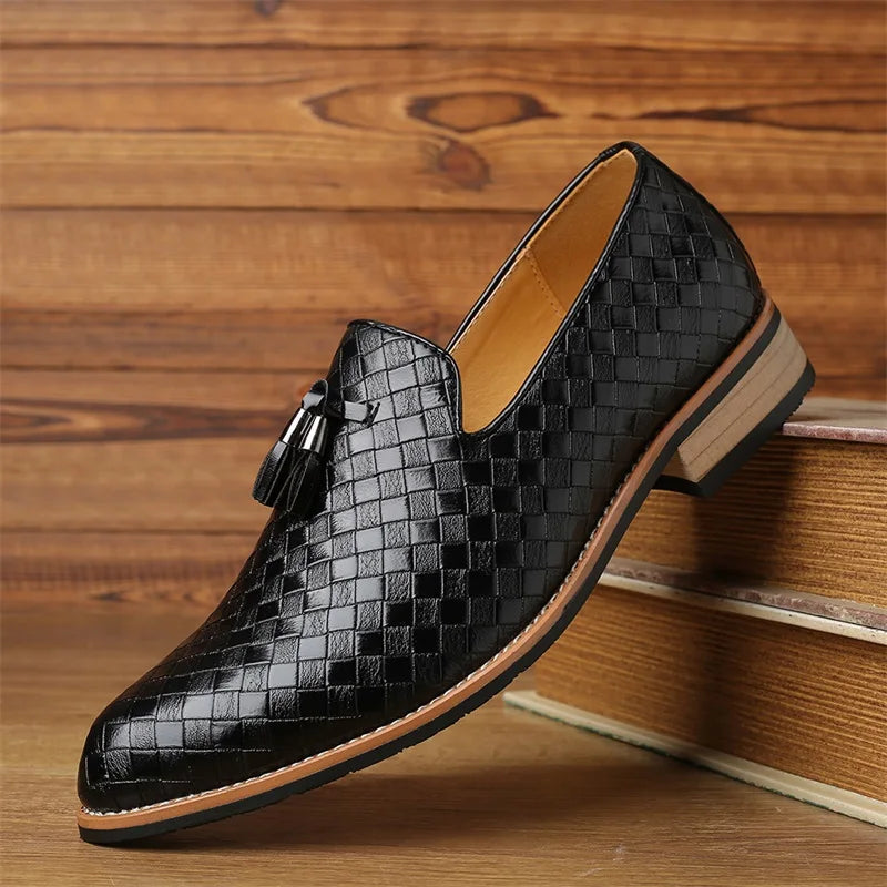 High-angle view of men's brown textured loafers with classic tassel detail, sophisticated look
