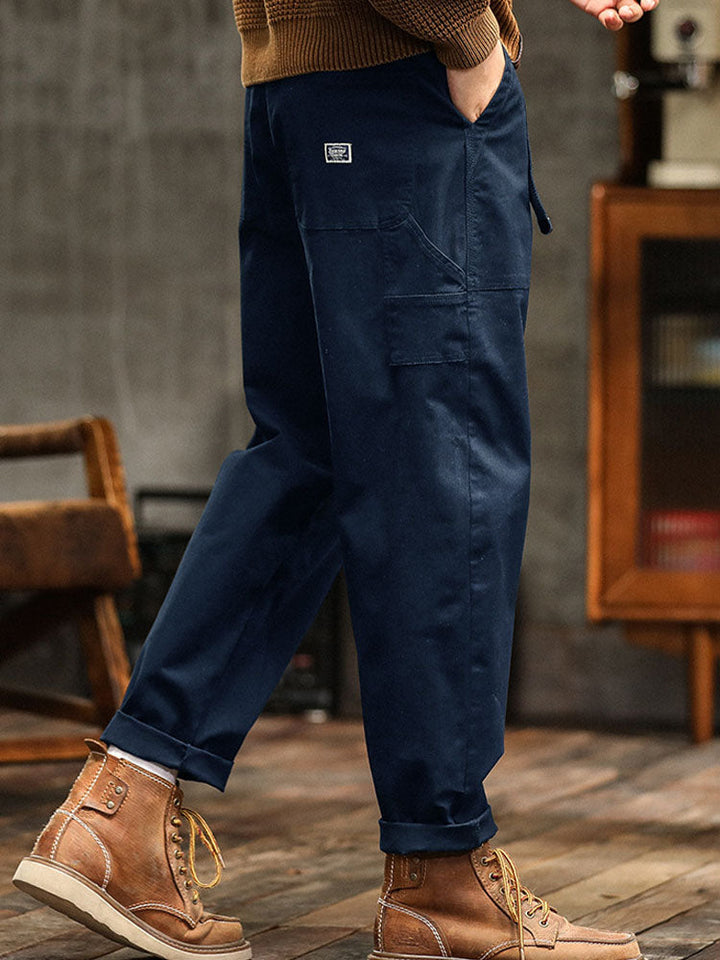 Everyday men's utility pants, workwear inspired vintage design with adjustable cuffs.